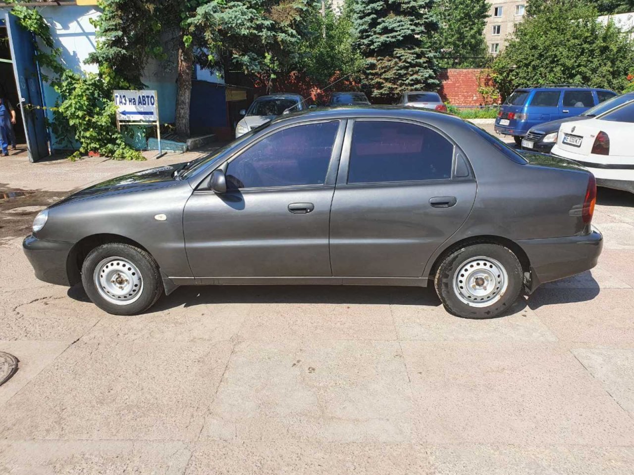 Daewoo, Lanos, 2013, Мокрый асфальт